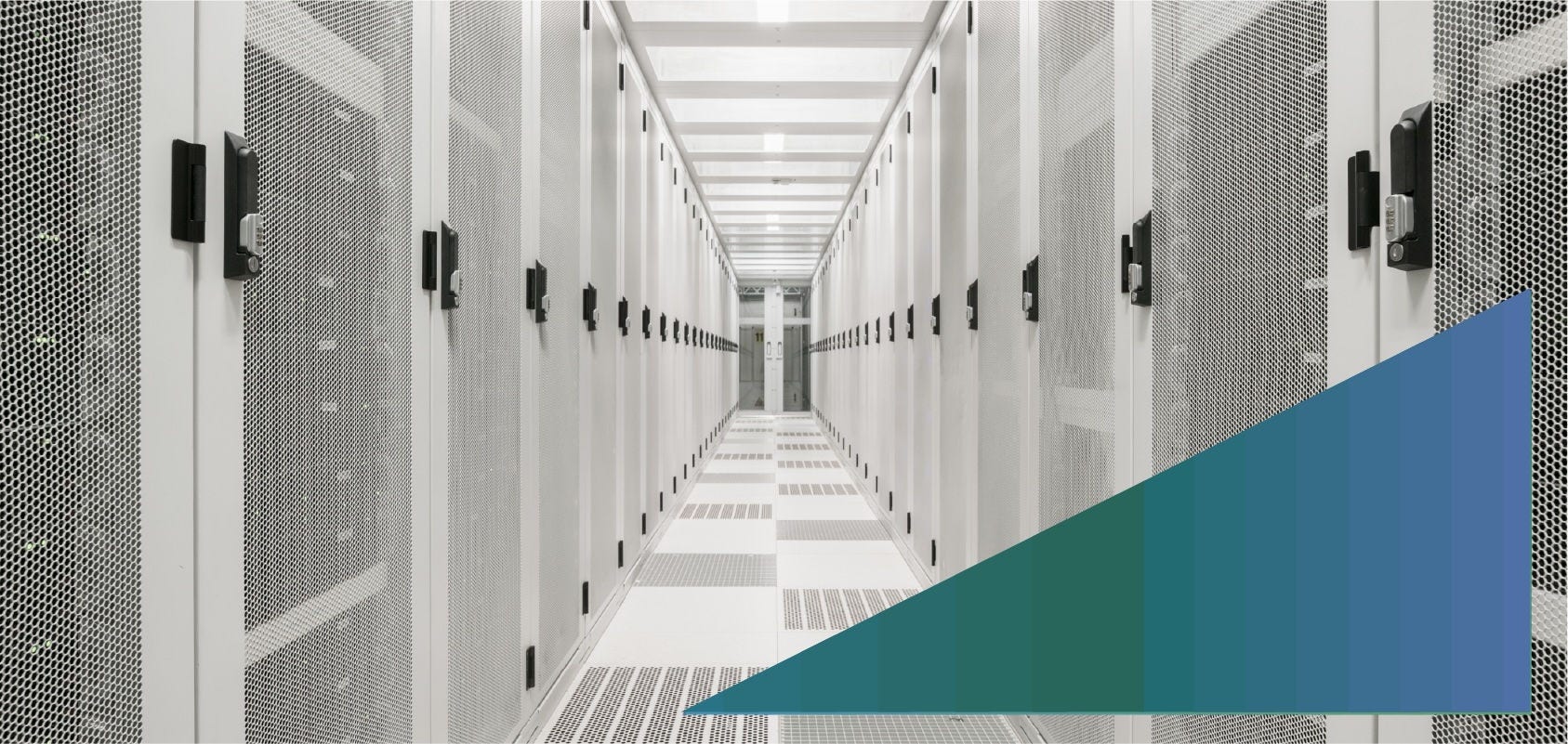 Aisle in a network server room where servers are locked behind grated doors
